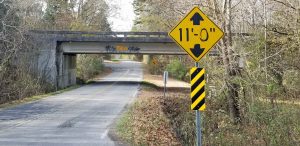 An 11 foot low clearance bridge is not the best sign to when my RV has a height of 13 feet. The campground just on the other side turned into a ten mile detour. Fortunately, I did not add to the scuff marks along the bottom of the overpass.