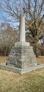 A monument to Meriwether Lewis which contains his remains and marks the location where he died along the Natchez Trace.