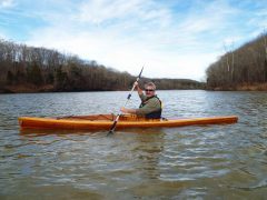 Brad Saum kayaking Green River Lake in Kentucky.