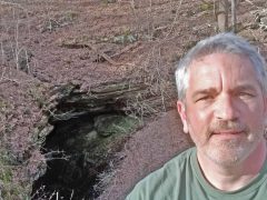 Brad Saum at Sand Cave entrance near Mammoth Cave in south-central Kentucky.