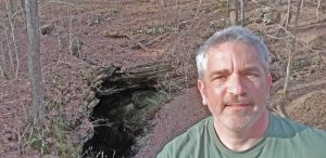 Brad Saum at Sand Cave entrance near Mammoth Cave in south-central Kentucky.