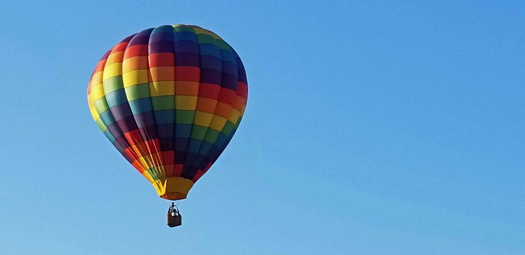 hot air balloon against blue sky