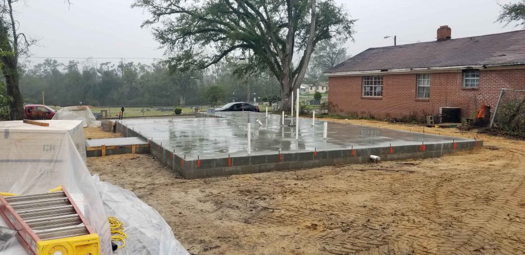 house foundation poured while rebuilding after Hurricane Michael
