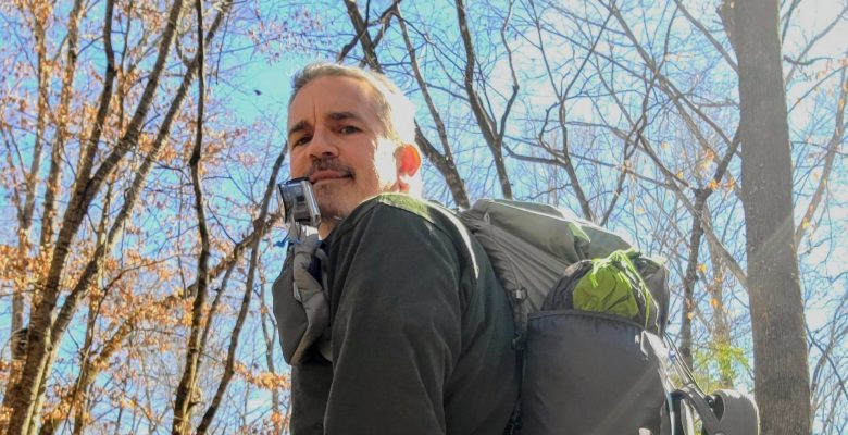 Brad Saum with Mariposa 60L backpack.