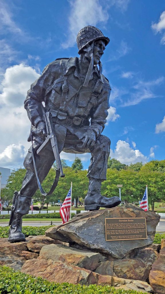 At over 16-feet tall, The Airborne Trooper statue, one of many Iron Mike statues around the country, has been prominent around Fort Bragg, NC since 1961.