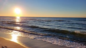 Sun rising over Pensacola Beach, Florida.