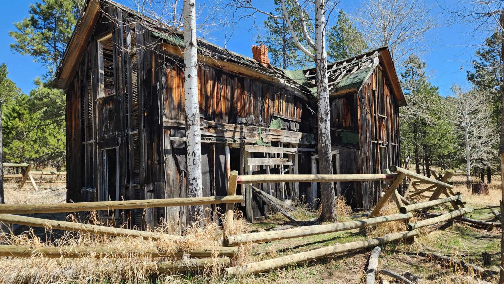 An old building remains of an old mining town called Spokane, South Dakota.