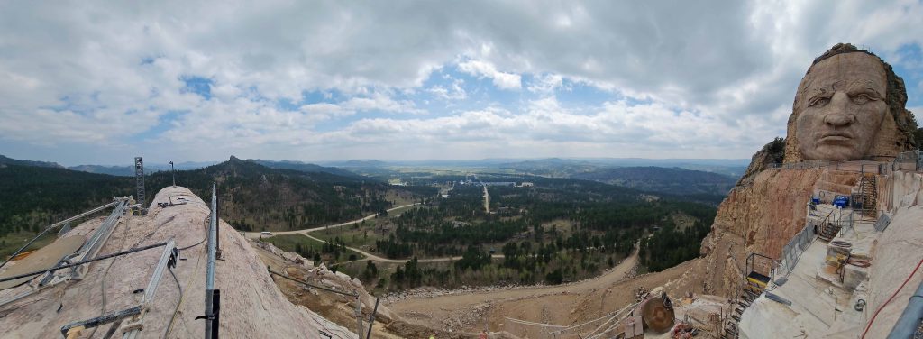 Crazy Horse Memorial and scenic view of the Black Hills of South Dakota.