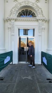 Author Brad Saum walking to White House door in Washington DC