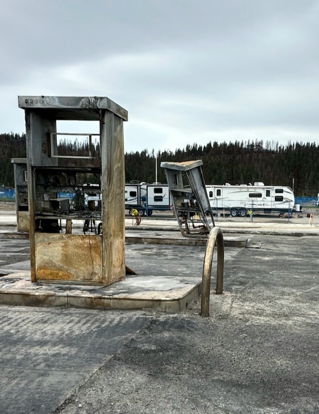 Two gas pumps barely recognizable following a fire that swept through multiple areas along the Icefields Parkway.