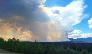 smoke rising from wildfire along the Alaska Highway